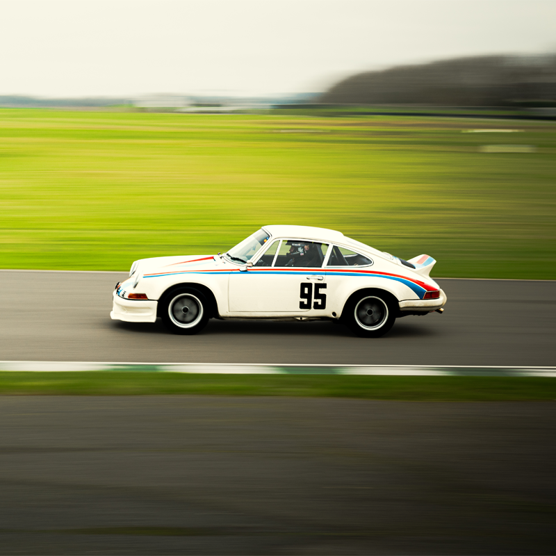 Porsche on track, panning shot